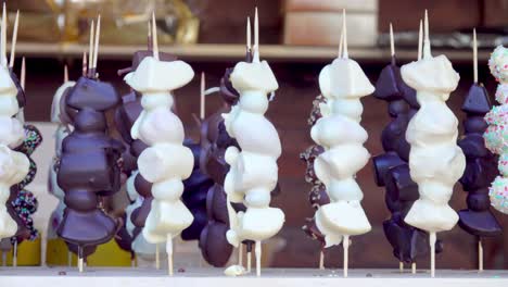 Chocolate-covered-fruit-on-a-stick-on-display-at-a-Christmas-market-stall