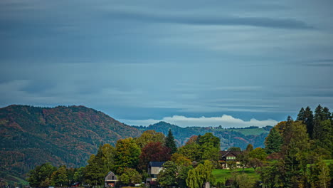 Time-Lapse-Landscape-of-Mountain-Rural-Village,-Green-Trees,-Clouds-in-Motion