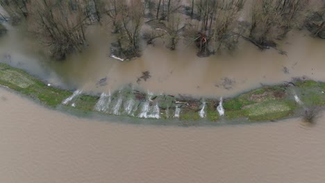 Aerial-of-flood-water-in-river-Waal,-Gorinchem,-Netherlands
