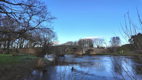 Historic-old-bridge-on-The-River-Suir-at-Kilsheelan-on-a-cold-winter-day