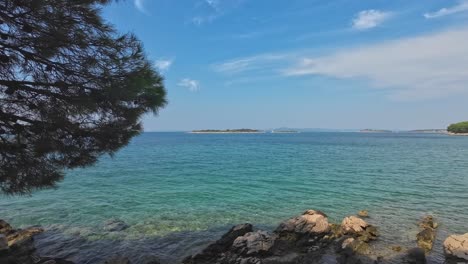 Panoramic-view-of-the-clear-Croatian-sea-with-islands-in-the-background