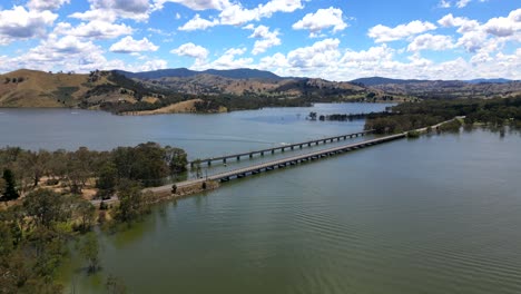 Eildon-Bridge-at-its-peak,-water-up-to-the-bridge,-after-local-flooding-in-Victoria