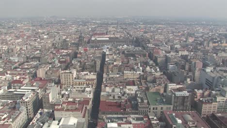 Aerial-panorama-shot-of-Ciudad-de-Mexico-with-Palacio-National-and-Catedral-Metropolitana