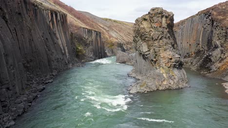 Flying-through-basalt-columns-in-Studlagil-canyon-in-East-Iceland