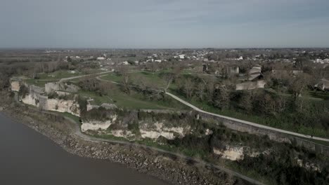 Riverfront-view-of-Citadelle-de-Blaye,-Bordeaux,-France---aerial