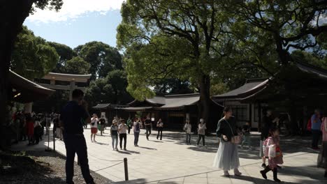 Tourists-walking-around-square-at-the-Meji-Shrine-slow-motion-shot