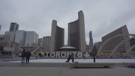 Tourists-Taking-Selfies-At-Toronto-City-Hall-And-Nathan-Phillips-Square