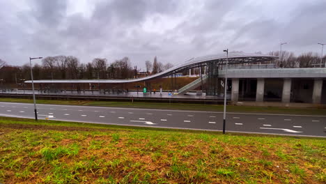 Noorderpark-metro-station-in-Amsterdam-Noord-wide-total-on-a-grey-windy-day