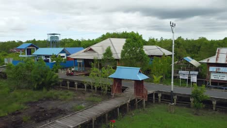 drone-showing-the-uniqueness-of-the-Agats-district-of-the-city-built-on-planks,-Papua