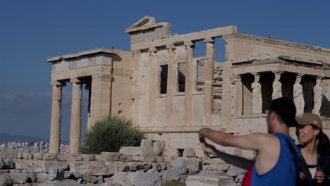 View-of-a-part-of-the-Parthenon-Temple,-visiting-tourists,-World-Heritage-sites