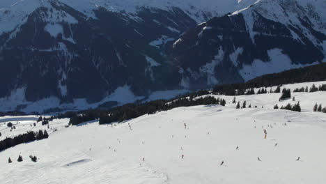 Saalbach-Hinterglemm-Ski-Resort-During-Winter-In-Austria---Drone-Shot