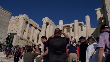 Crowd-of-tourists-visiting-the-Parthenon-temple-in-Athens,-Greece-tourist-places,-travel-guide