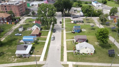 Aerial-sideways-drone-shot-from-Cass-community-tiny-homes-project-for-people-in-need,-recently-released-prisoners-and-homeless-people