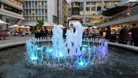 Australia-Square-Sydney-Fountains-changing-colour-with-big-screen-in-background