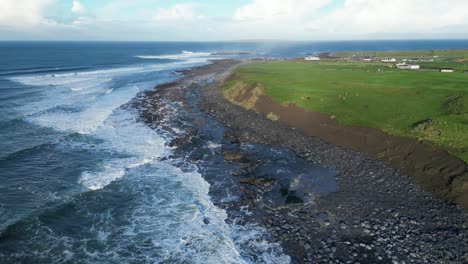 Aerial-orbiting-shot-of-the-rugged-cliffscape-at-Dollin,-Ireland-during-summer