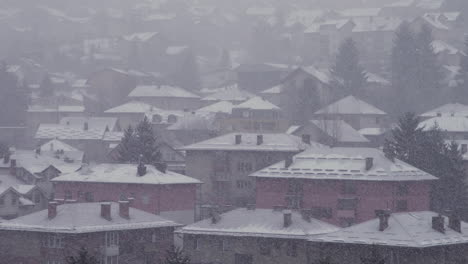 Rooftops-getting-covered-with-snow-from-heavy-snow-fall