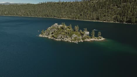 Aerial-footage-pulling-back-from-an-island-in-Lake-Tahoe