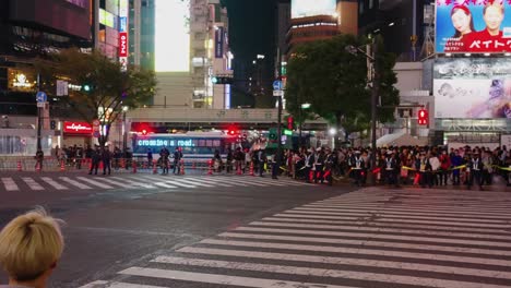 Slow-motion-shot-of-Shibuya-Scramble-with-Police-guards-preventing-Halloween-Celebration