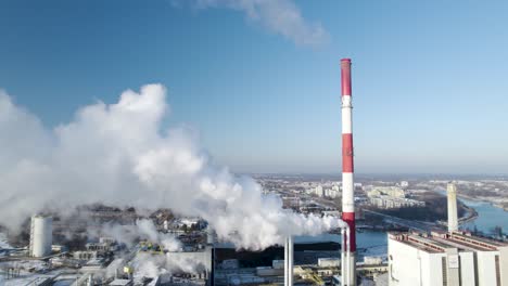 Aerial-dolly-back-view-from-heat-power-plant-near-the-city-centrum