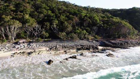 Ocean-Waves-With-Foam-Splashing-On-The-Shore,-Noosa-Beach,-Queensland,-Australia---Drone-Shot
