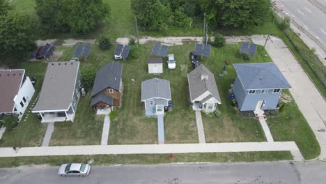 Aerial-sideways-shot-from-the-Tiny-home-project,-Cass-community-for-people-in-need,-next-to-a-highway,-Detroit,-Michigan