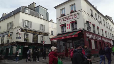 Le-Consulat-Cafe-in-District-of-Montmartre-with-Parisians-Walking-Around
