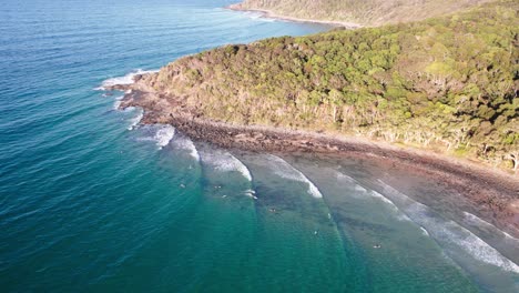 Noosa-Heads-With-Surfers-On-Queensland's-Sunshine-Coast,-Australia---Drone-Shot