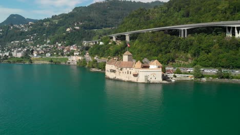 Aerial-Orbit-of-Chillon-Castle-on-Lake-Geneva