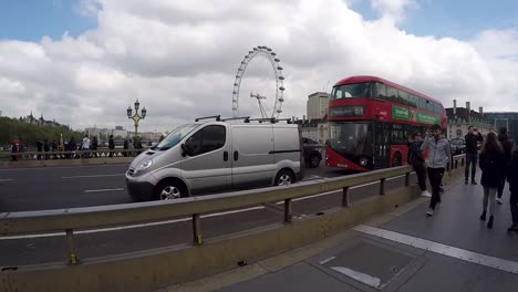 shot-of-London-eye-on-street-with-traffic