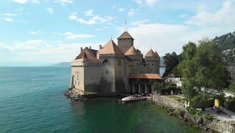 Drone-Boom-and-Tilt-Movement-of-Chillon-Castle-on-Lake-Geneva