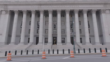 Front-of-United-States-court-house-building-empty-during-Coronavirus-tilt-up