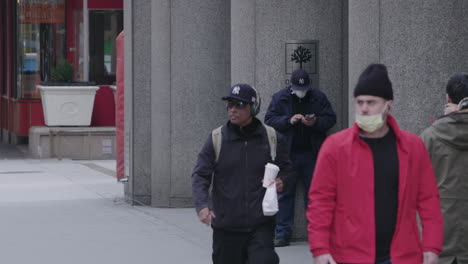 Men-and-Security-guard-wearing-face-mask-on-42nd-Street