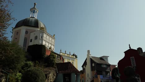 Low-Angle-View-Of-The-Houses-Of-Portmeirion,-An-Italian-Style-Tourist-Village-On-The-Coast-Of-North-Wales
