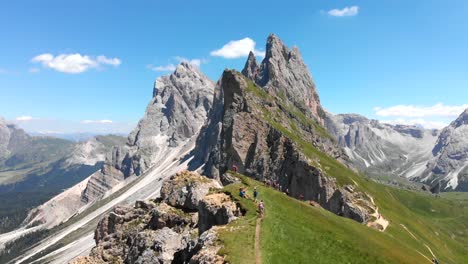Drone-Flying-Low-Over-Hikers-on-Seceda-Ridgeline-in-the-Italian-Dolomites