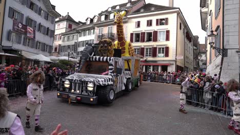 Solothurn,-Switzerland---March-03th,-2019:-A-huge-vehicle-at-the-carnivals-deal-with-a-safari-zoo-theme