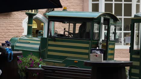 Driver-Gets-In-The-Small-Train-In-Portmeirion-Vilage