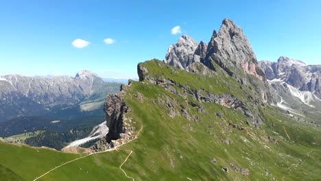 Aerial-Shot-Descending-Sideways-over-the-Seceda-Ridgeline-in-the-Italian-Dolomites