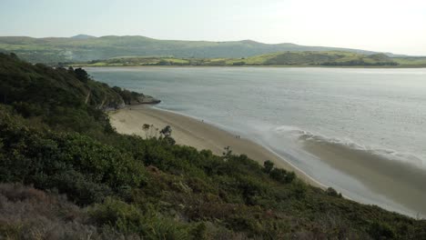 View-Of-The-Beach-Of-Portmeirion-Village,-River-Afon-Dwyryd-And-Hills-In-Background