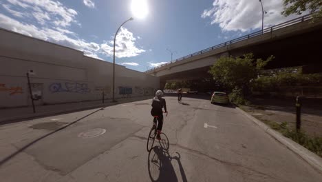 POV-Following-Bike-Courier-Along-Casgrain-Avenue-In-Montreal