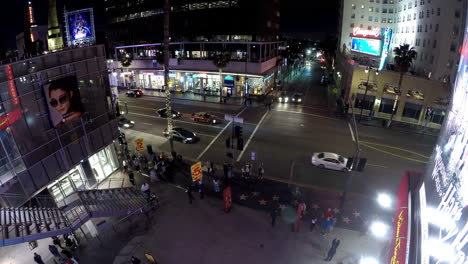Time-lapse-of-street-corner-on-Hollywood-Blvd-at-night