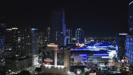 Downtown-Los-Angeles-CA-USA-at-Night,-Aerial-View-of-Shiny-Towers-and-Crypto-Arena