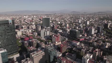 Luftaufnahme,-Innenstadt-Von-Mexiko-Stadt,-Gebäude-Und-Wolkenkratzer-Der-Metropole,-Drohnenaufnahme