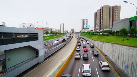 Busy-Motorway-Traffic-Heading-Into-City-In-Peru