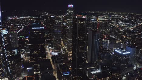 Night-in-Downtown-Los-Angeles-USA,-Aerial-View-of-Skyscrapers-and-Towers-in-Lights