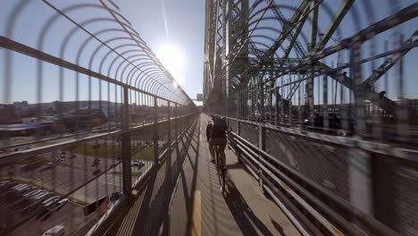 POV-Following-Bike-Courier-Across-Jacques-Cartier-Bridge-In-Montreal