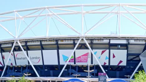 Static-shot-of-Newham-London-stadium-football-ground-formerly-known-as-Olympic-stadium,-new-home-for-West-Ham-United-Football-Club-and-now-temporary-open-as-a-vaccination-centre-2021