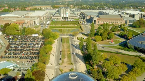 Aerial-shot-from-the-top-of-Atomium-revealing-The-Centenary-Palace-at-Place-de-Belgique,-the-home-of-Brussels-Expo-exhibition-centre-in-Belgium