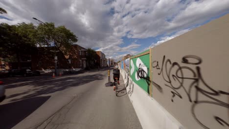 POV-Cycling-Along-Bellechasse-Street-In-Montreal