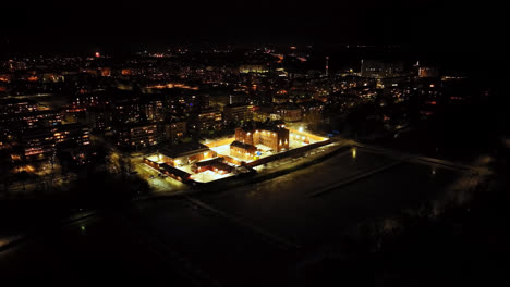 Aerial-view-around-the-Prison-of-Vaasa,-winter-night-in-Ostrobothnia,-Finland