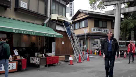 Japanese-engineering-fixing-the-food-stall-lights-in-Kyoto